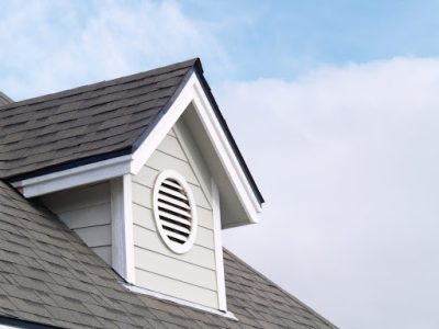 New Construction Of A Home With Peak On Roof For More Real Estate Photos
